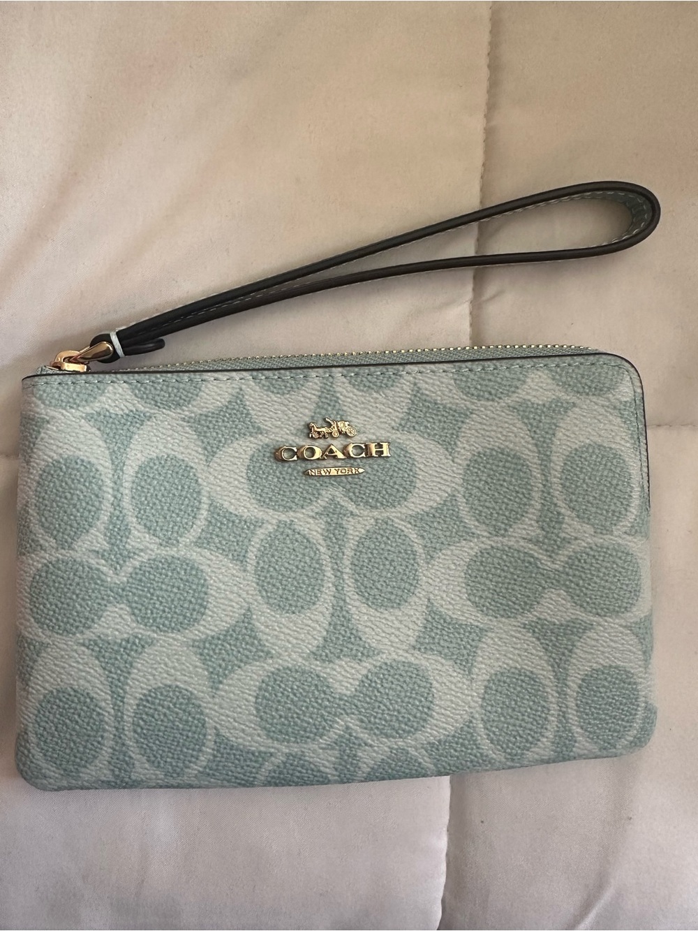 Coach corner zip wristlet in light blue